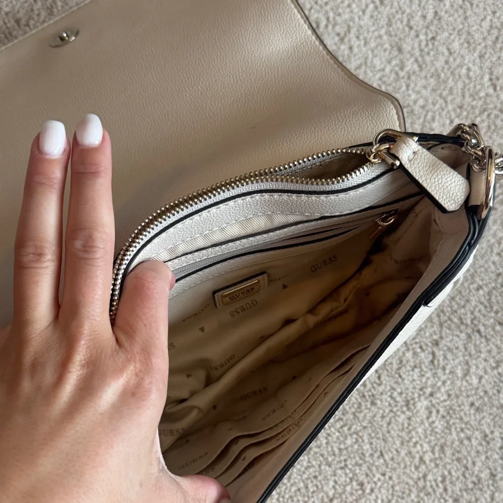 GUESS Cream Pebbled Leather Crossbody with Gold Triangle Logo